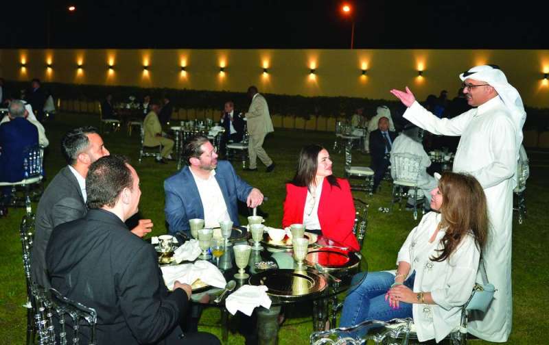 


السفير بن سعد محادثاً القائم بالأعمال السوري وعدداً من الحضور 