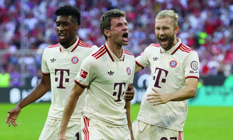 توماس مولر محتفلاً بهدفه في مرمى فرايبورغ