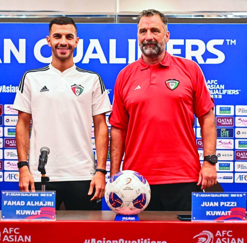 


بيتزي والهاجري خلال المؤتمر الصحافي 