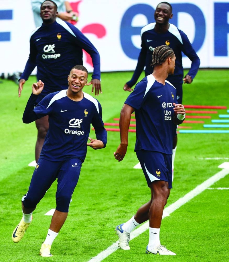 


كيليان مبابي خلال تدريبات منتخب فرنسا 	(أ ف ب) 