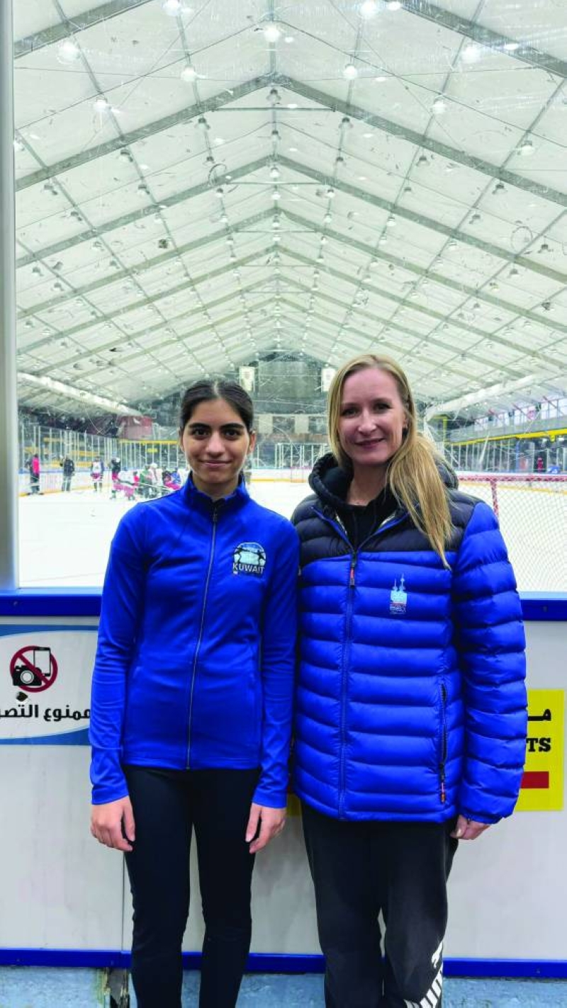 


جراغ مع مدربتها يوليا مارتيشيفا 