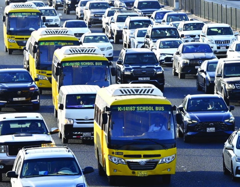 


كثافة وانسيابية في الطرق... وعودة لباصات المدارس 	(تصوير أسعد عبدالله) 