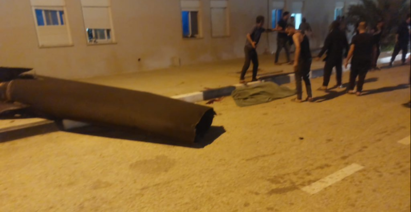 جثمان الفلسطيني بجوار الصاروخ في أريحا