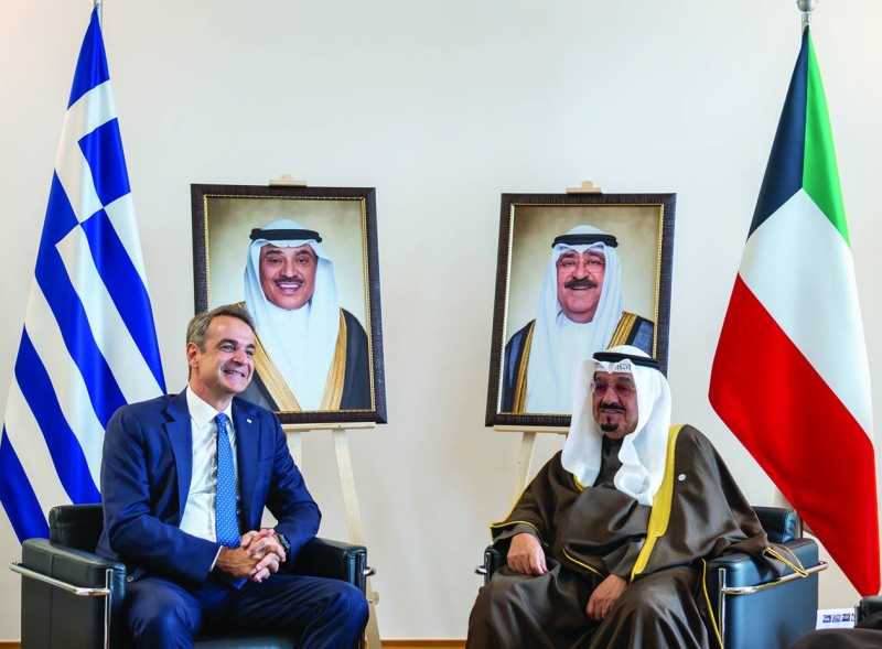 


... ومع رئيس وزراء اليونان 
