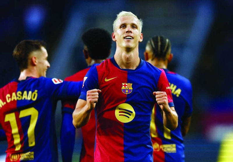 


داني أولمو محتفلاً بهدفه في مرمى إسبانيول 