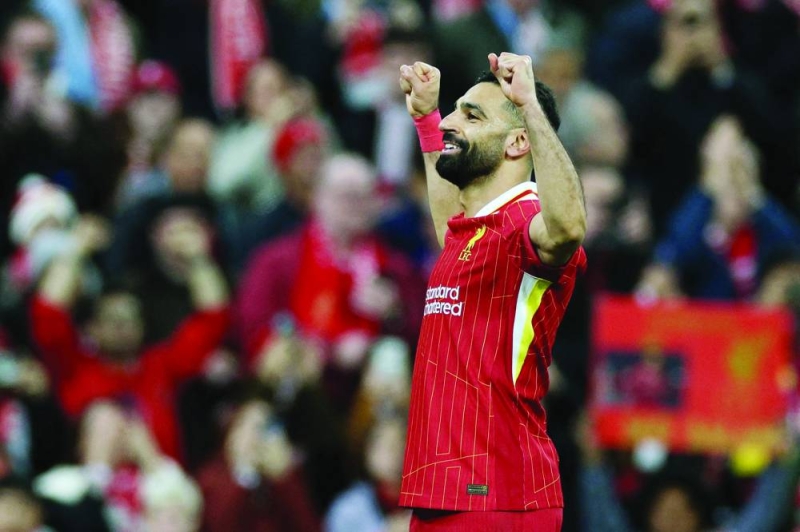


محمد صلاح محتفلاً بهدفه في مرمى مانشستر سيتي 	 (أ ف ب) 