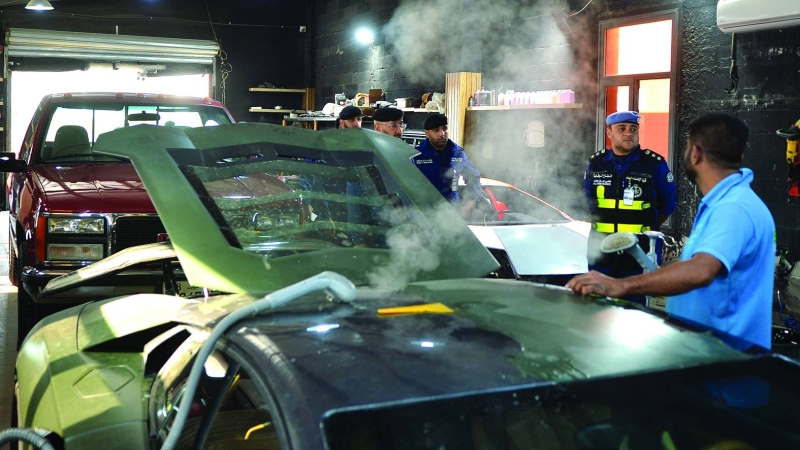 تفتيش محل لتصليح السيارات 