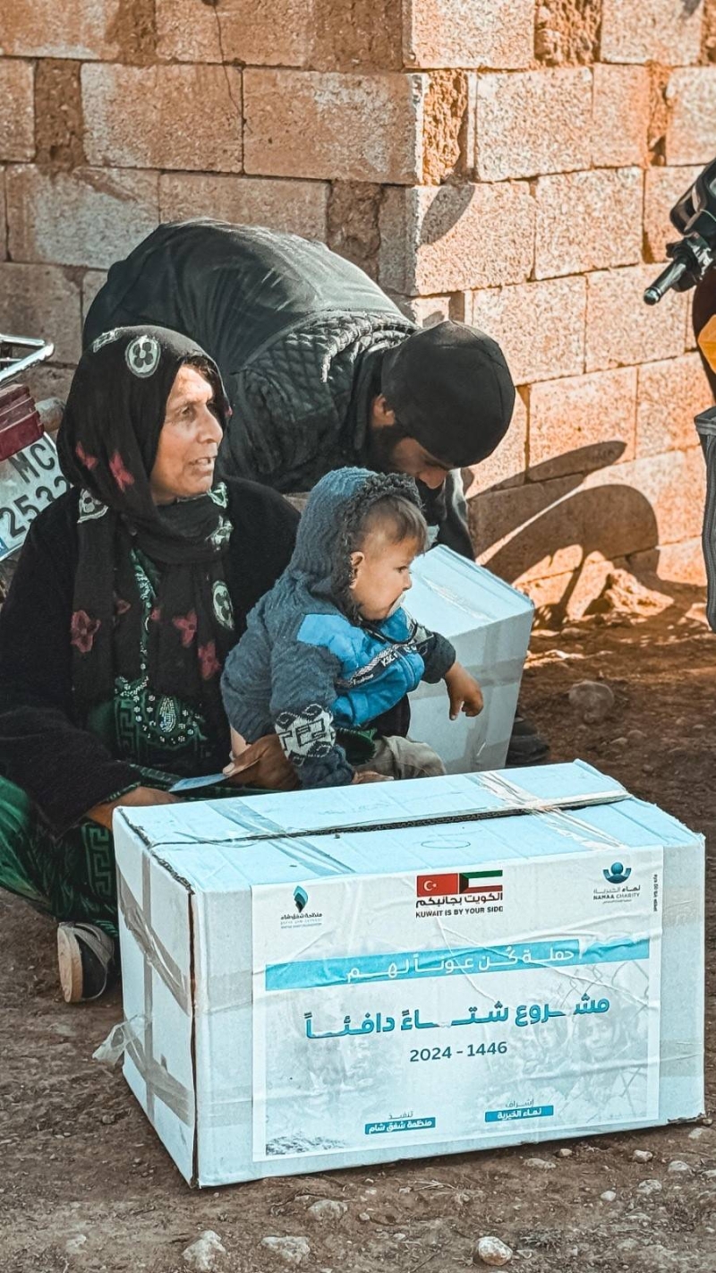 إحدى الأسر المستفيدة