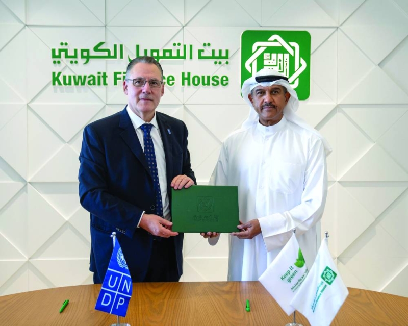 عبدالوهاب الرشود وعبدالله الدردري في توقيع اتفاقية تحالف التكافل العالمي مع البرنامج الانمائي للأمم المتحدة