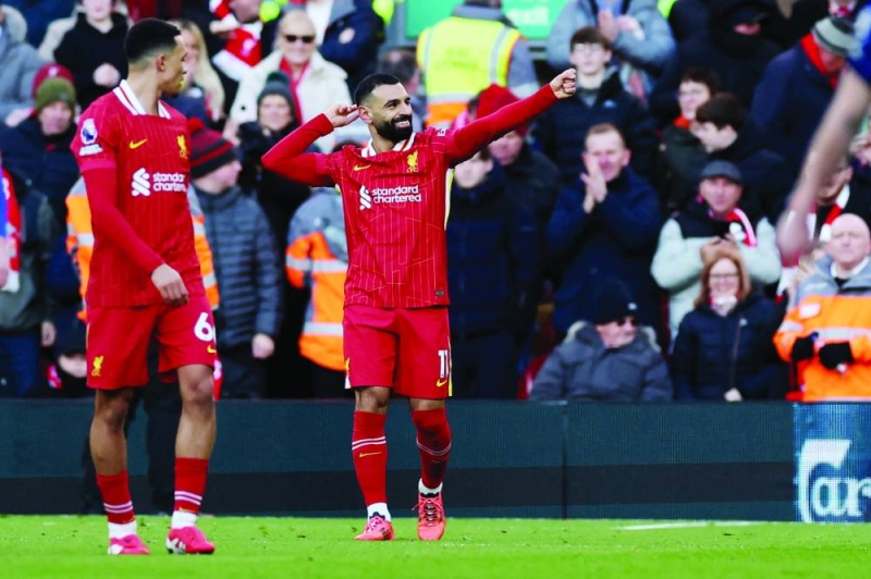 


محمد صلاح محتفلاً بهدفه في مرمى إيبسويتش تاون     	          (رويترز) 