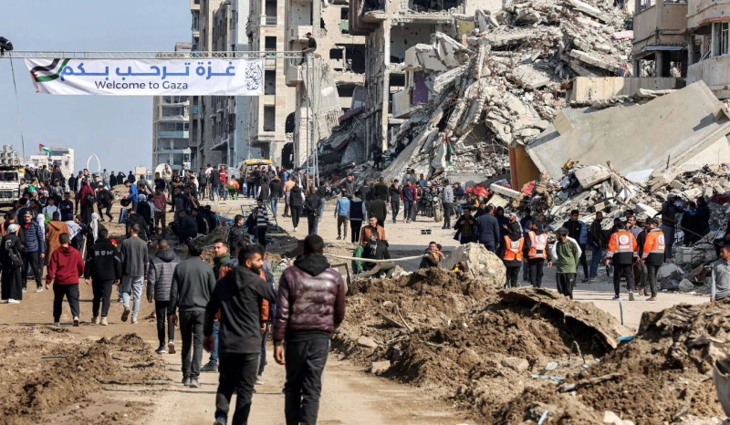 لافتة ترحيبية بعودة النازحين إلى غزة