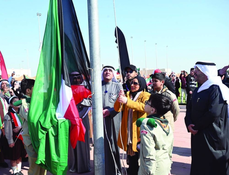 الحويلة ترفع العلم في احتفالية دور الرعاية الاجتماعية