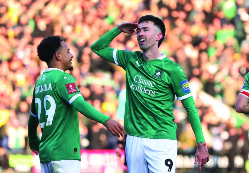 ريان هاردي محتفلاً بهدفه في مرمى ليفربول (رويترز)