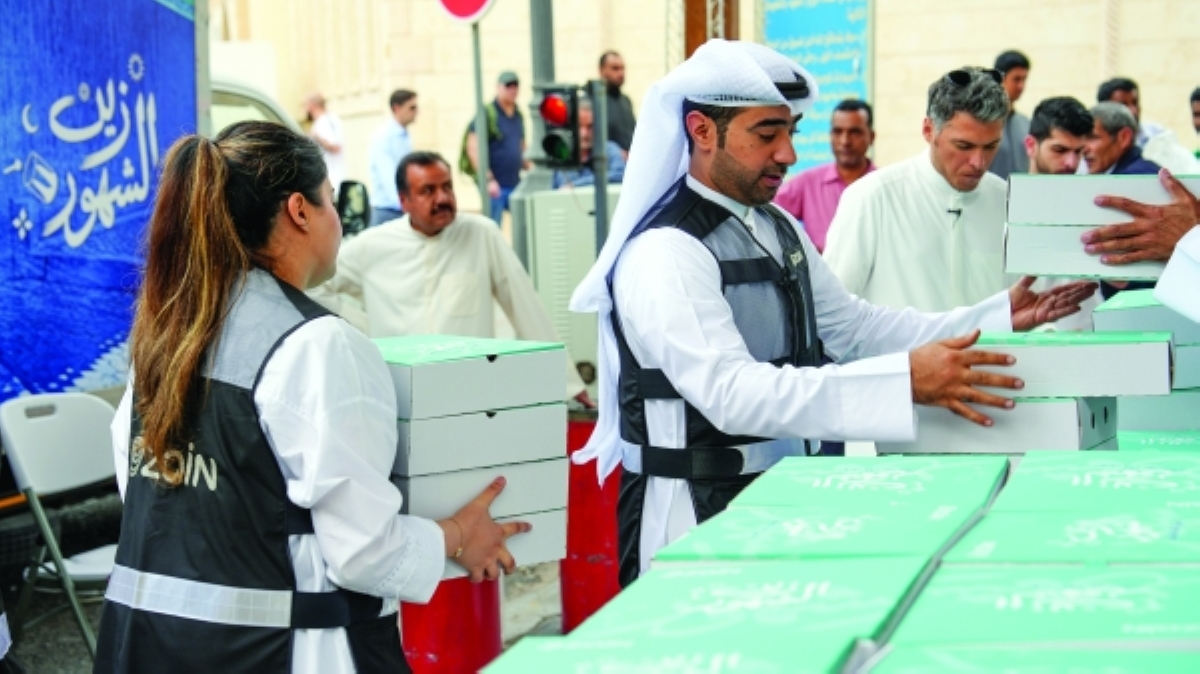 توزيع وجبات إفطار الصائم