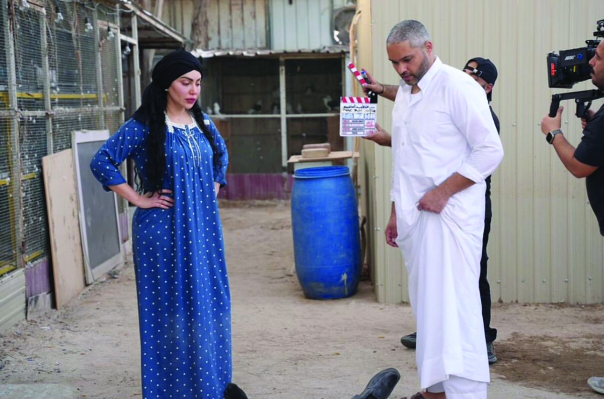 


فوز الشطي ومحمد الدوسري خلال تصوير العمل 