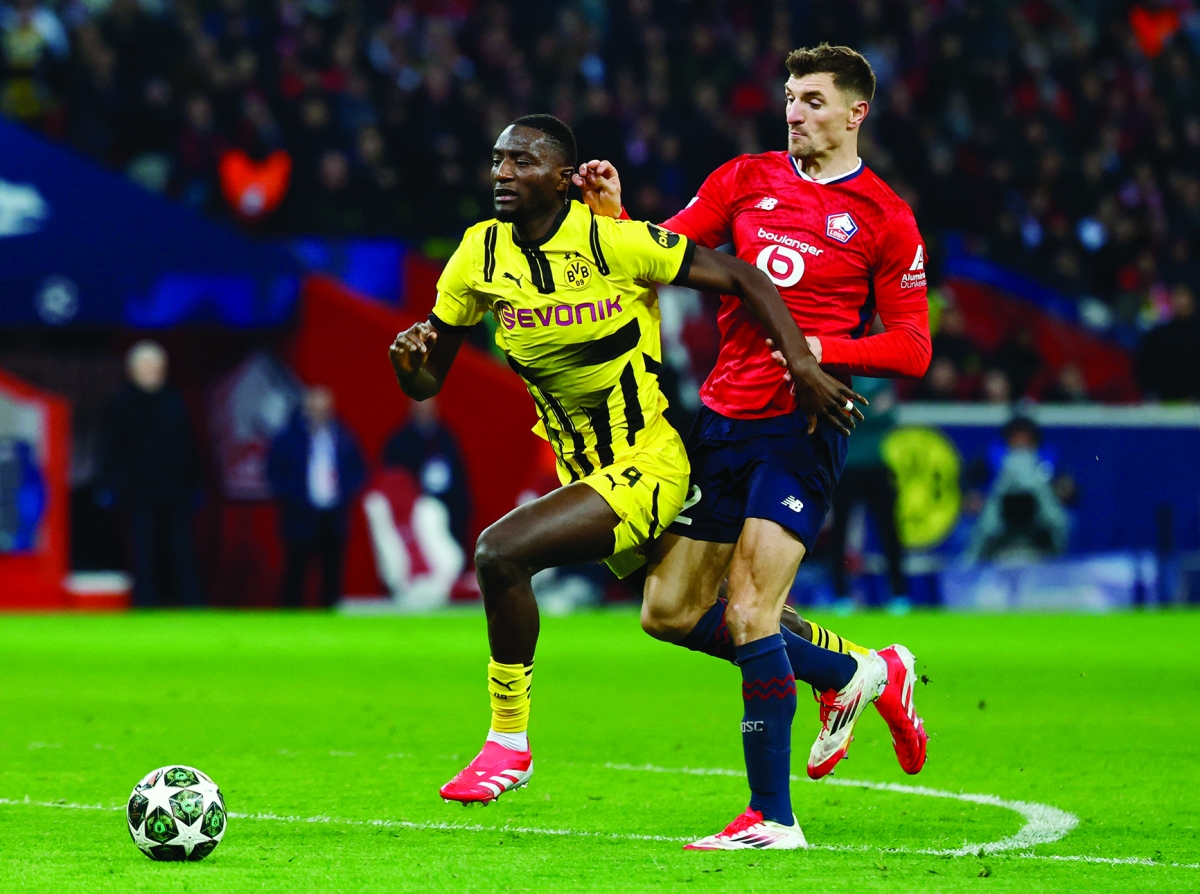 


مهاجم بوروسيا دورتموند سيرهو غيراسي خلال المباراة أمام ليل	 (رويترز) 