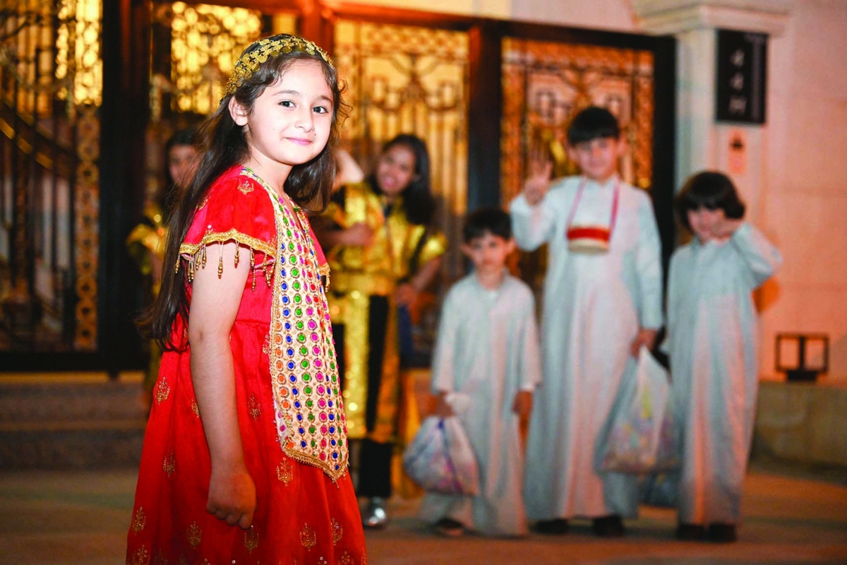 أطفال يحتفلون بالقرقيعان