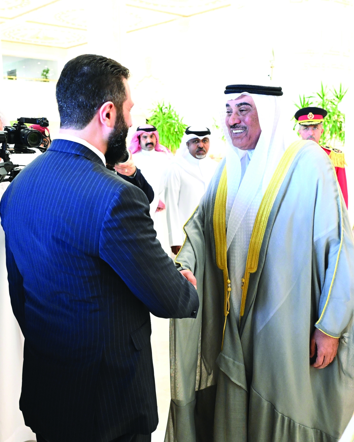 


ولي العهد مصافحاً الرئيس السوري 