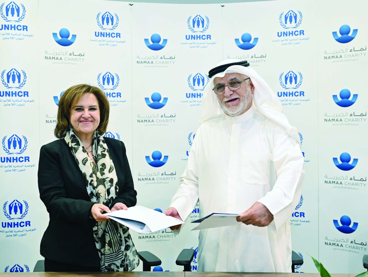 الربيعان وممثل «نماء» عقب توقيع الاتفاقية 