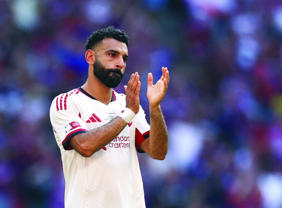 محمد صلاح خائباً بعد الخسارة	 (رويترز) 