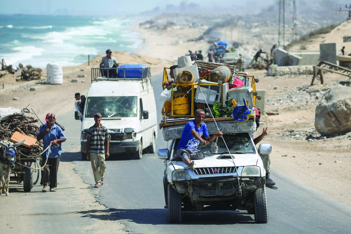 النزوح الفلسطيني يتواصل يومياً هرباً من الغارات (أ ف ب)