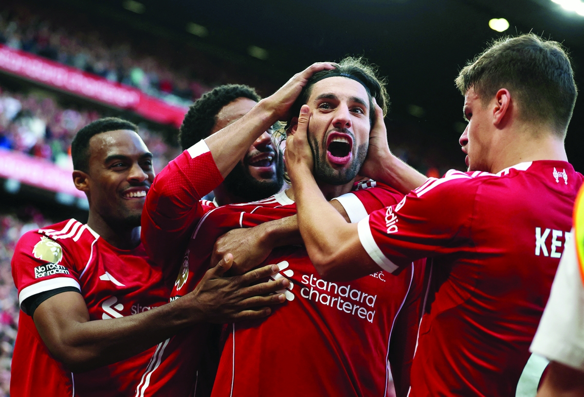 


دومينيك سوبوسلاي محتفلاً بهدفه في مرمى أرسنال 	(رويترز) 