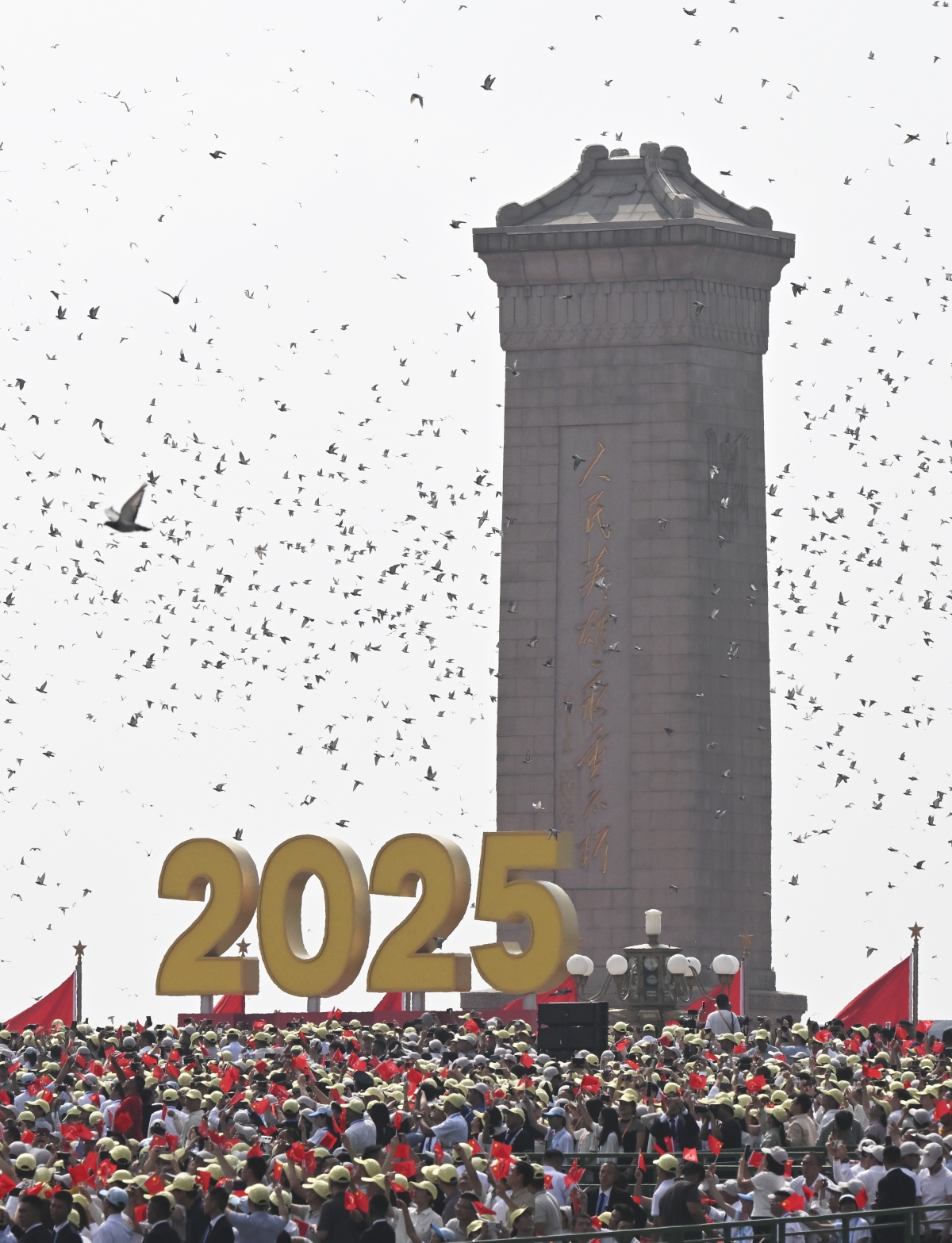 (250903) -- BEIJING, Sept. 3, 2025 (Xinhua) -- Pigeons are released during a grand gathering to commemorate the 80th anniversary of the victory in the Chinese People's War of Resistance against Japanese Aggression and the World Anti-Fascist War in Beijing, capital of China, Sept. 3, 2025. (Xinhua/Xiao Yijiu)