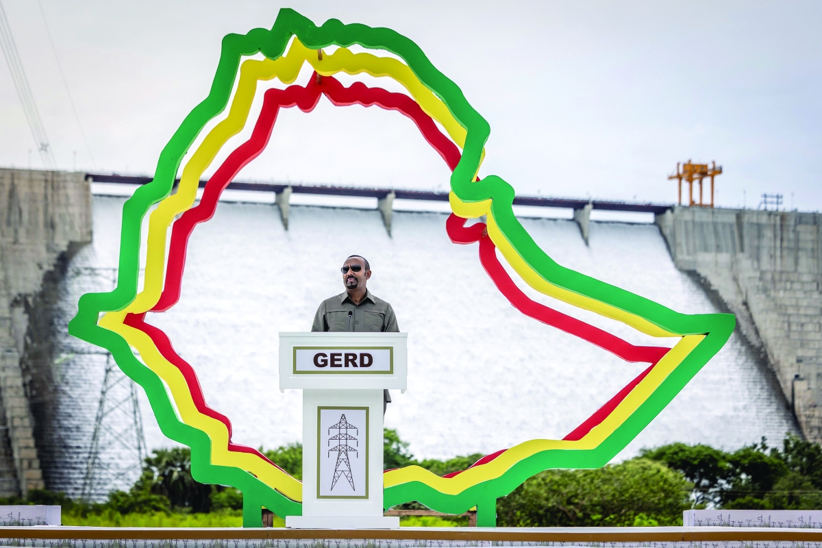 أبيي أحمد متحدثاً خلال تدشين سد النهضة (أ ف ب)