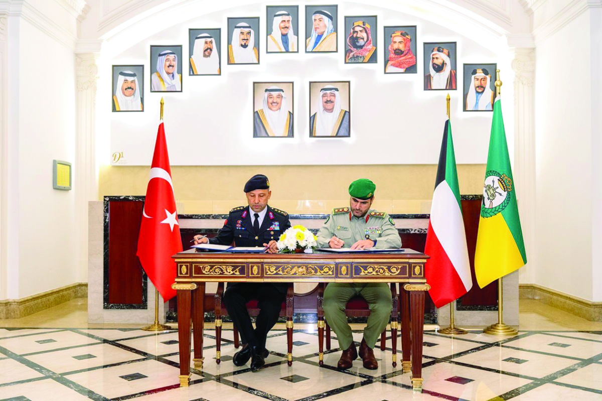 العقيد نوري والعقيد باشوول يوقّعان البروتوكول