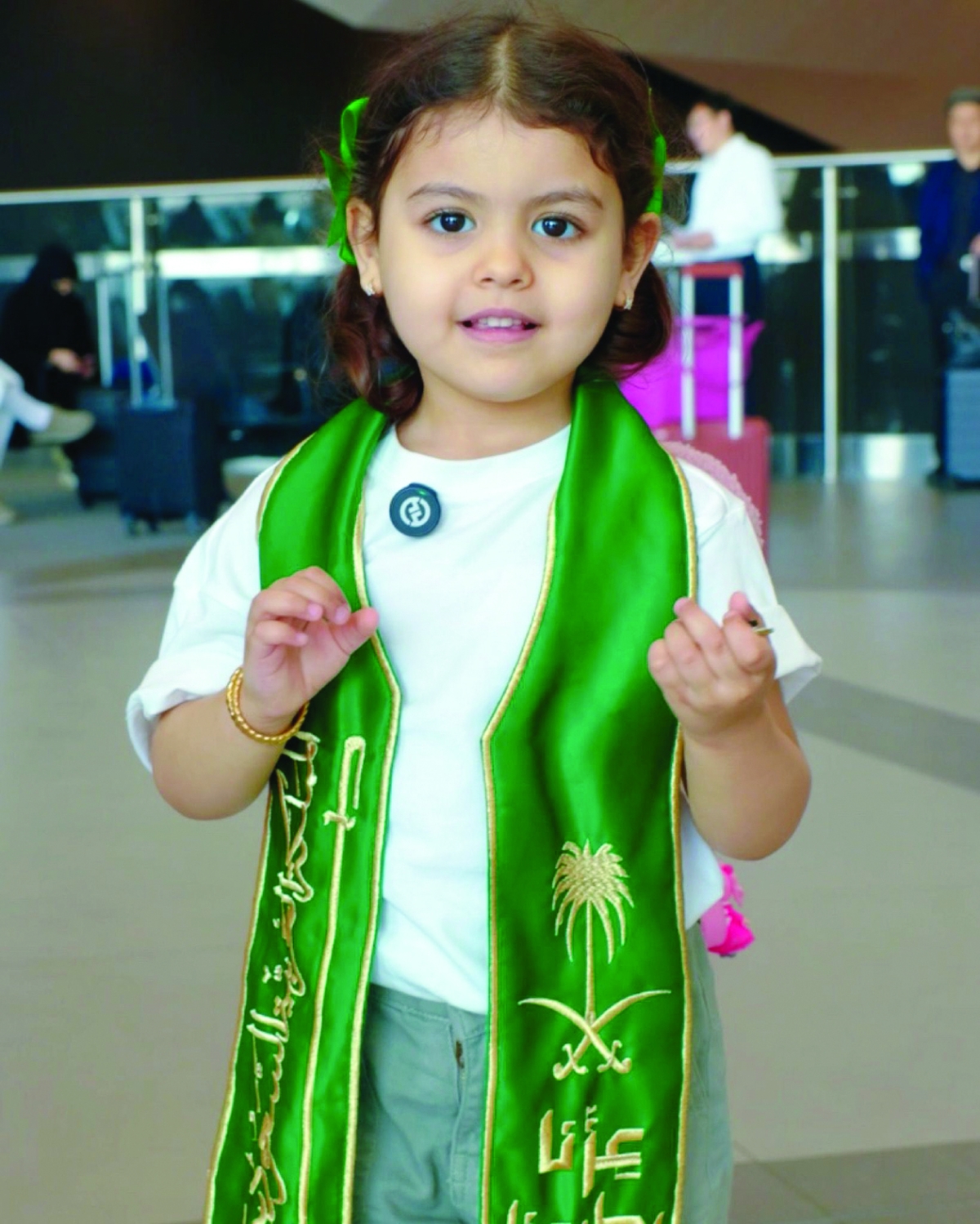 


زهرة تتزين بعلم المملكة 