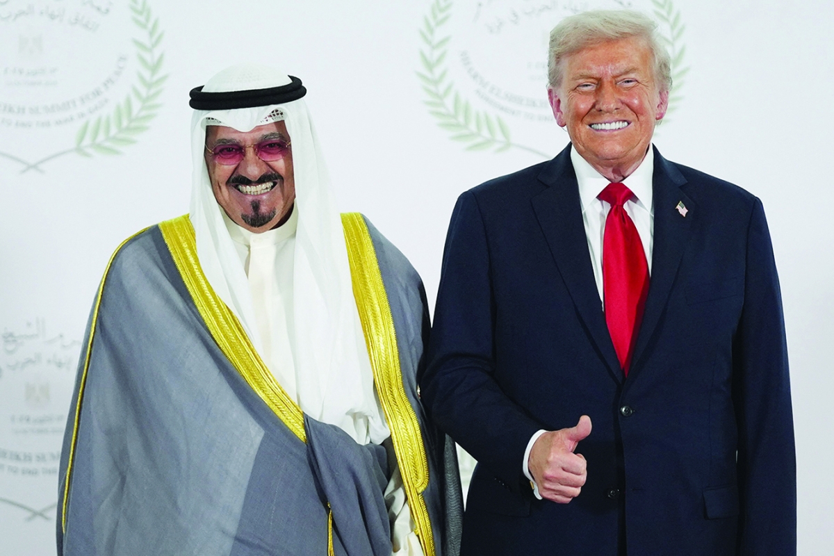 ممثل الأمير والرئيس الأميركي دونالد ترامب على هامش القمة 	(ا ف ب) 