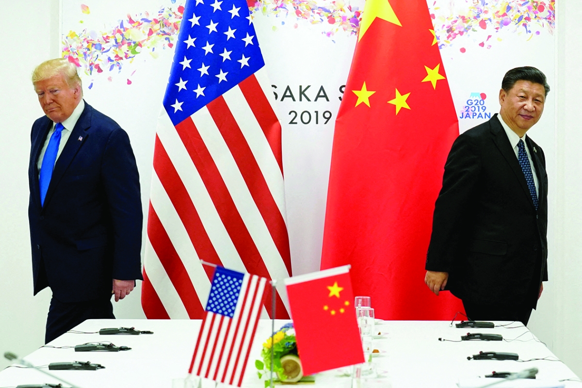 ترامب وجينبينغ خلال قمة قادة مجموعة العشرين في أوساكا عام 2019 (رويترز)
