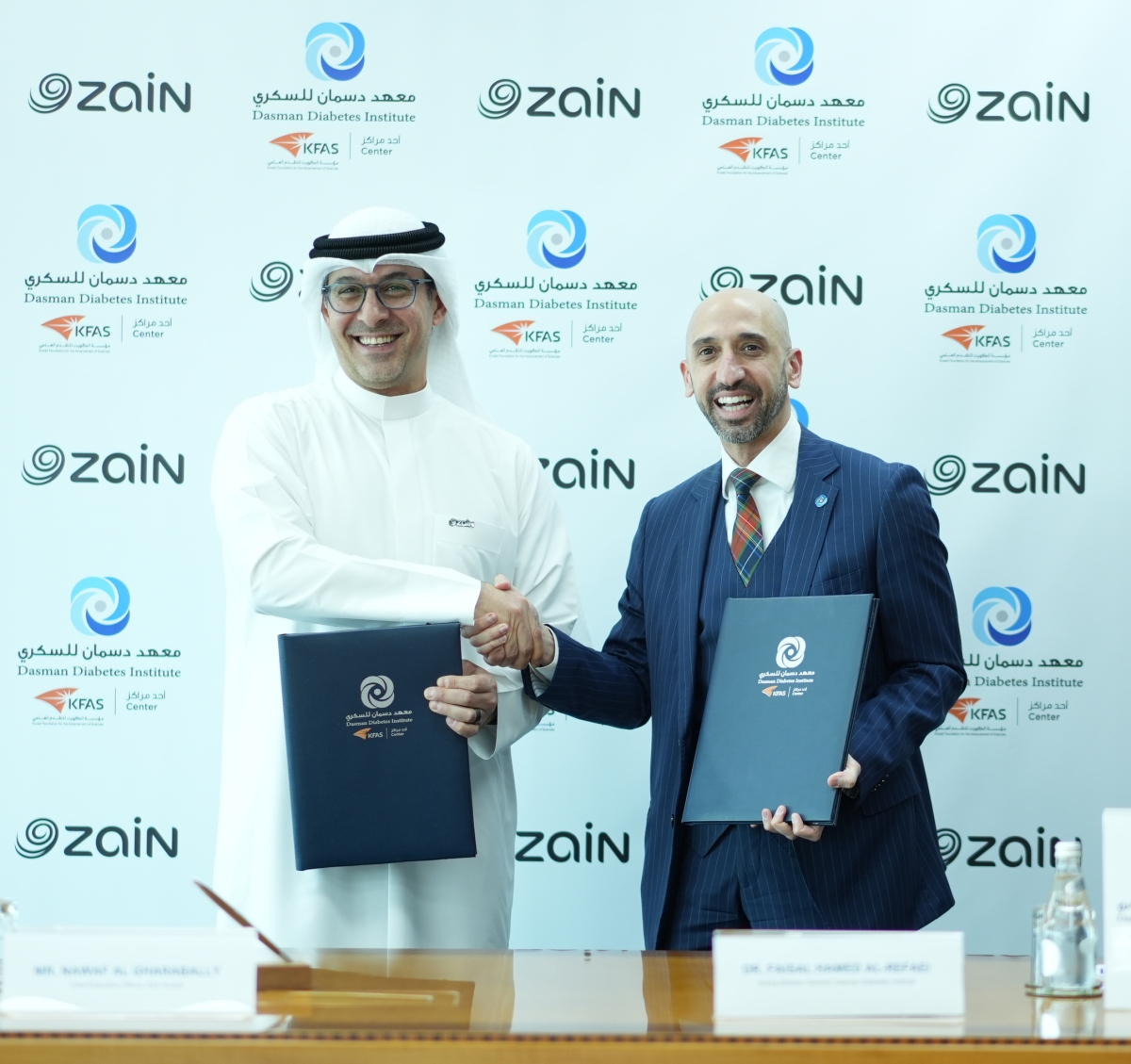  الرفاعي والغربللي بعد توقيع المُذكّرة