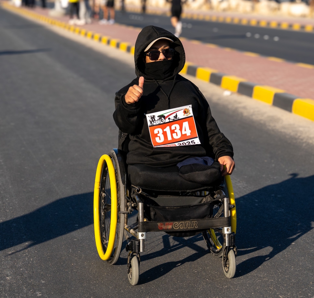 مشاركة من ذوي الاحتياجات الخاصة