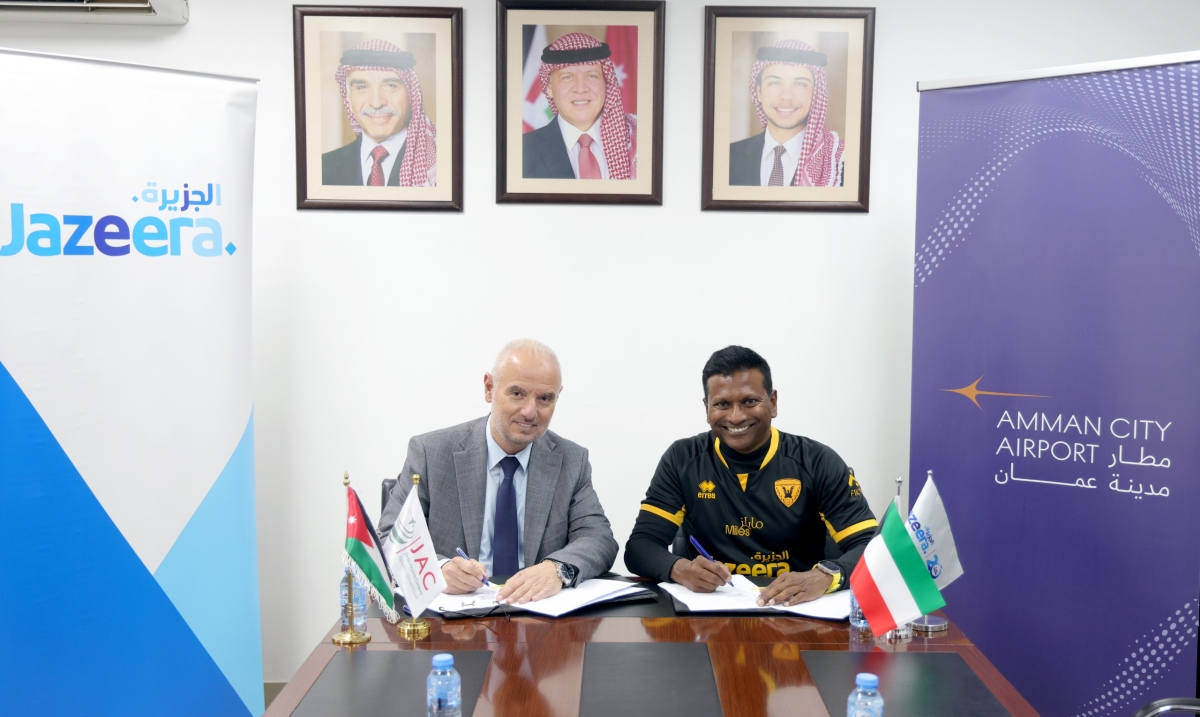 باسوباثي والعزام خلال توقيع مذكرة التفاهم 