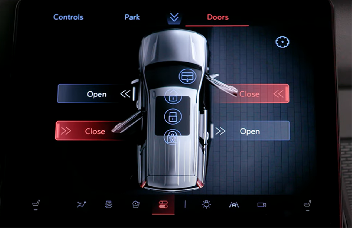 Infotainment screen view of the Cadillac Escalade showing Power Assist Doors controls