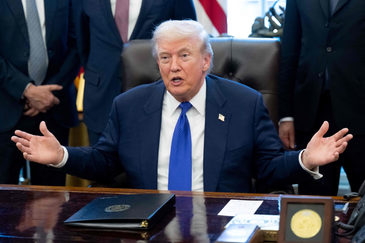 ‏ترامب‏‏ يتحدث لصحافيين في البيت الأبيض  (أ ف ب)