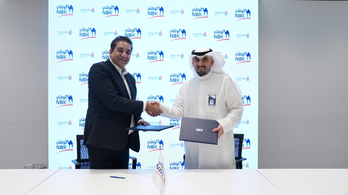 محمد العثمان و روهيت ناندا خلال توقيع الشراكة