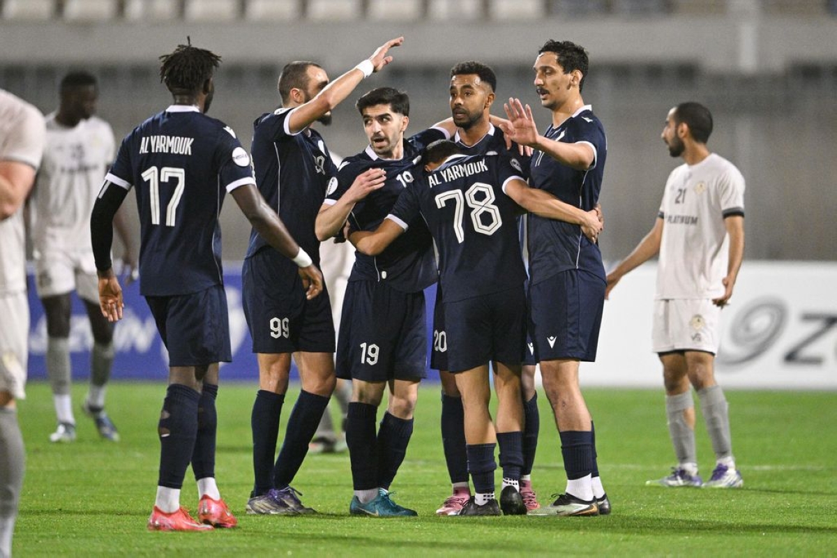 لاعبو اليرموك يحتفلون بالفوز