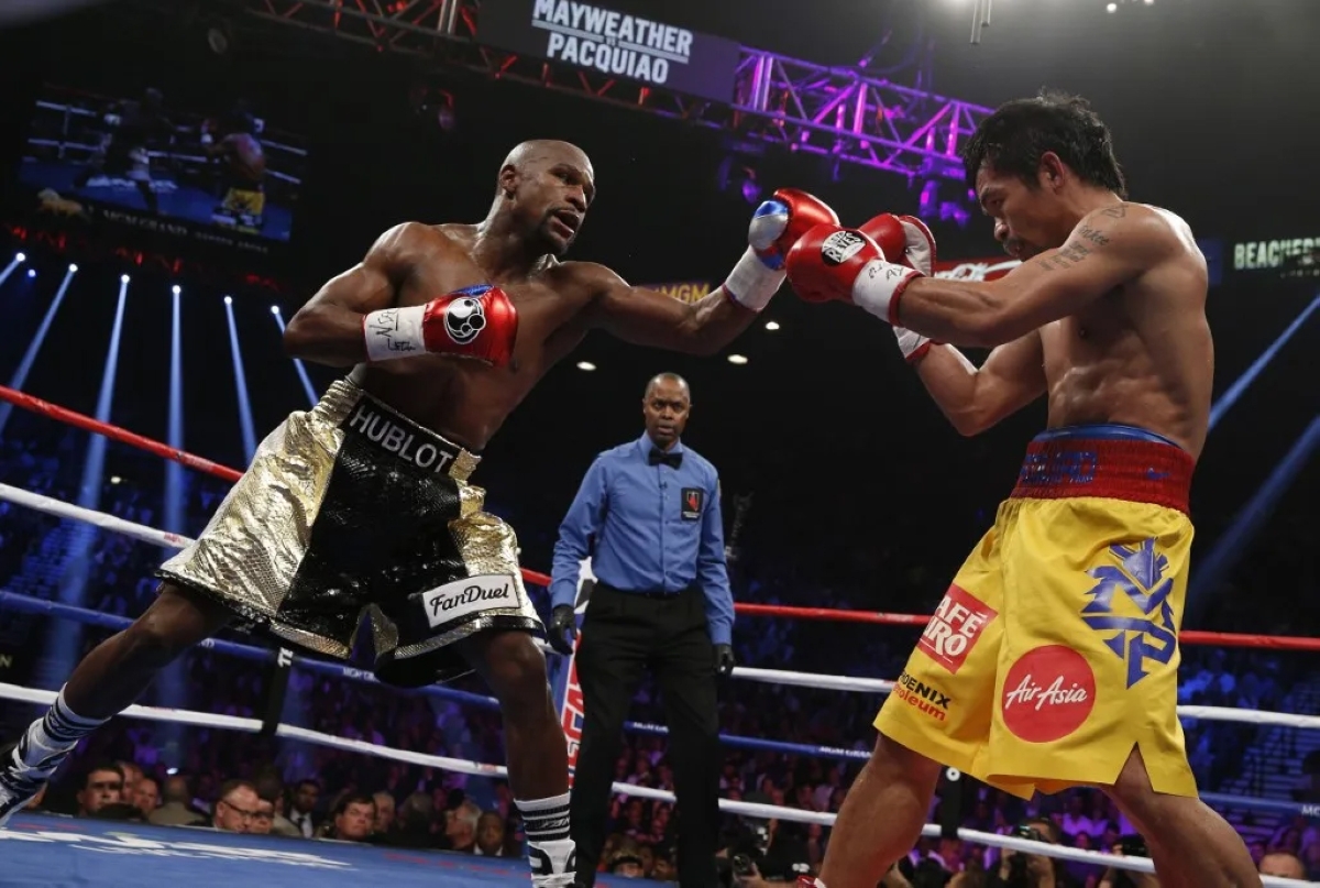 فلويد مايويذر وماني باكياو خلال لقاء سابق (أرشيفية)