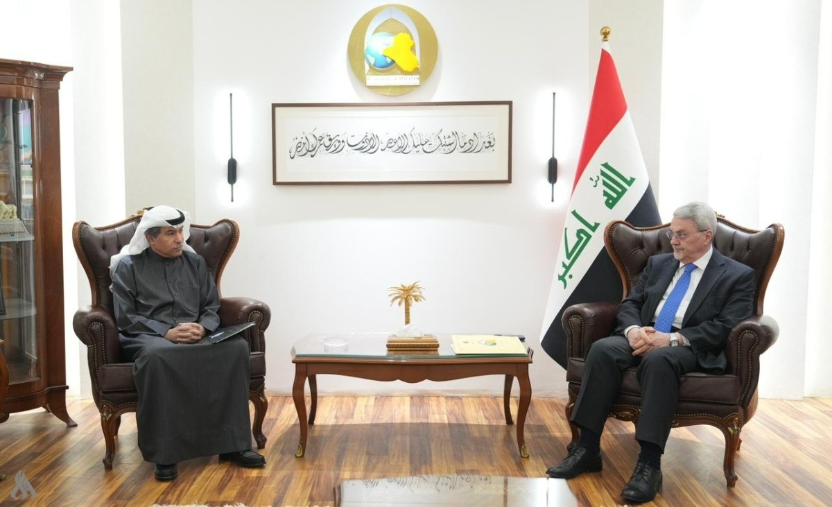 لقاء السفير حسن الزمان مع وكيل وزارة الخارجية العراقية محمد بحر العلوم