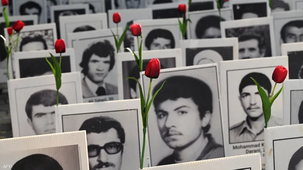 صور لضحايا الإعدام في إيران خلال تظاهرات في باريس (أرشيفية)