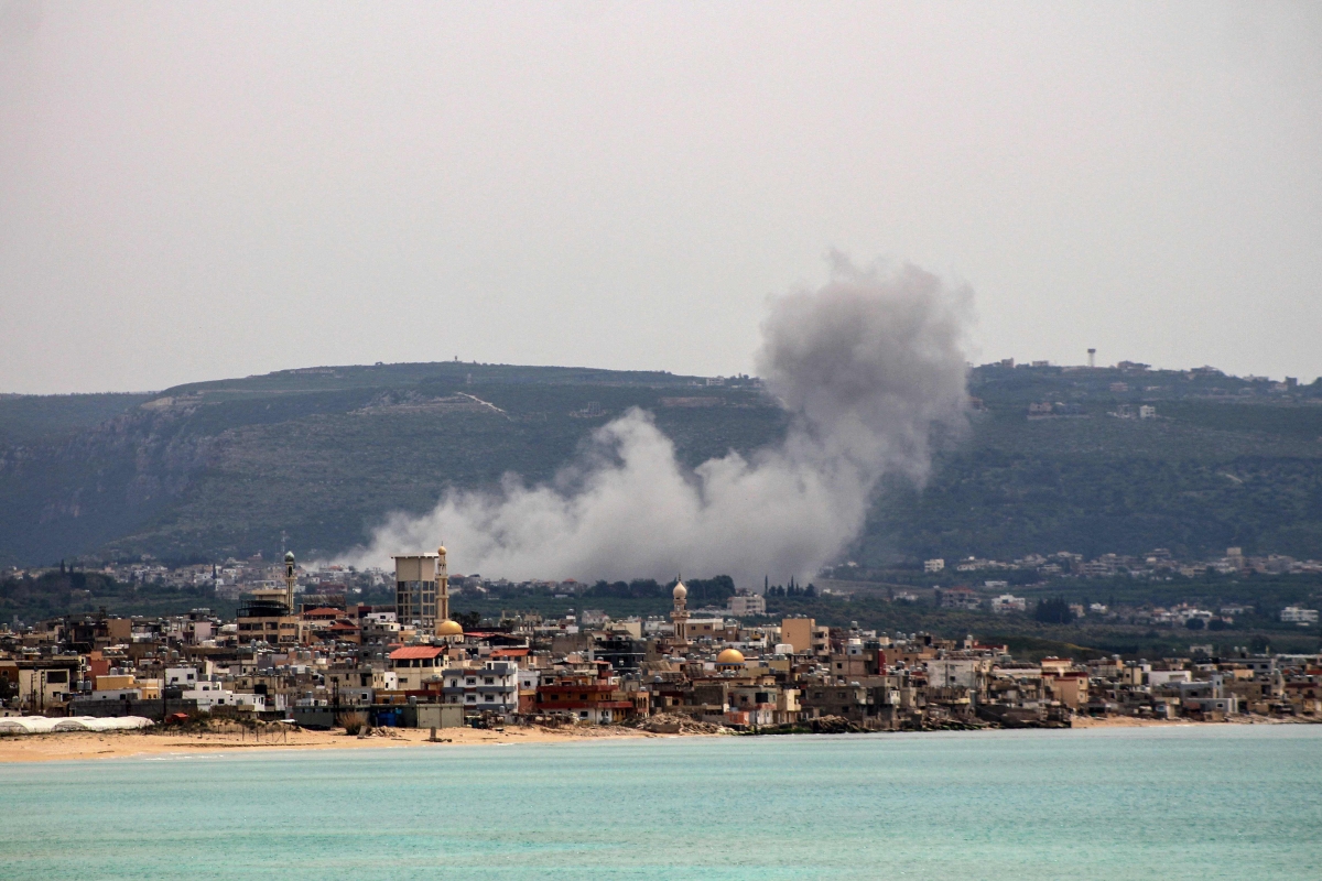  دخان غارة إسرائيلية على بلدة القليلة جنوب لبنان (أ ف ب)
