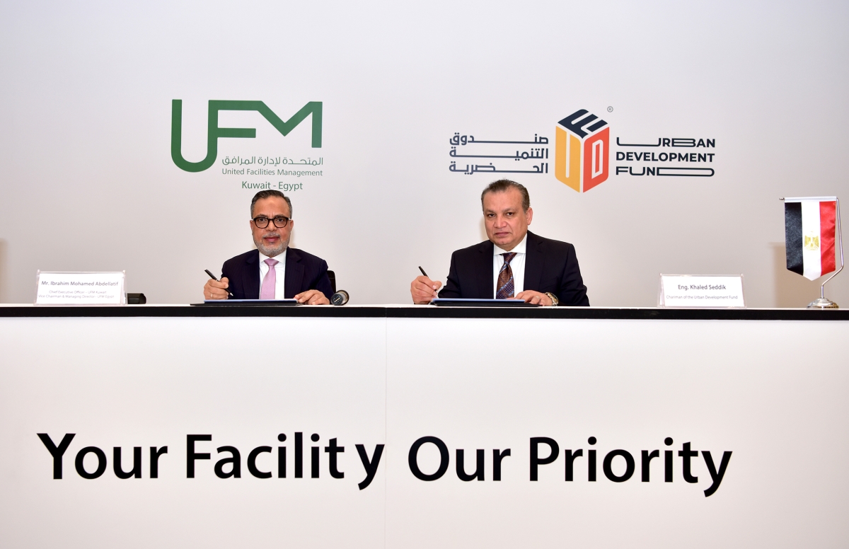 عبداللطيف وصديق خلال توقيع الشراكة الإستراتيجية